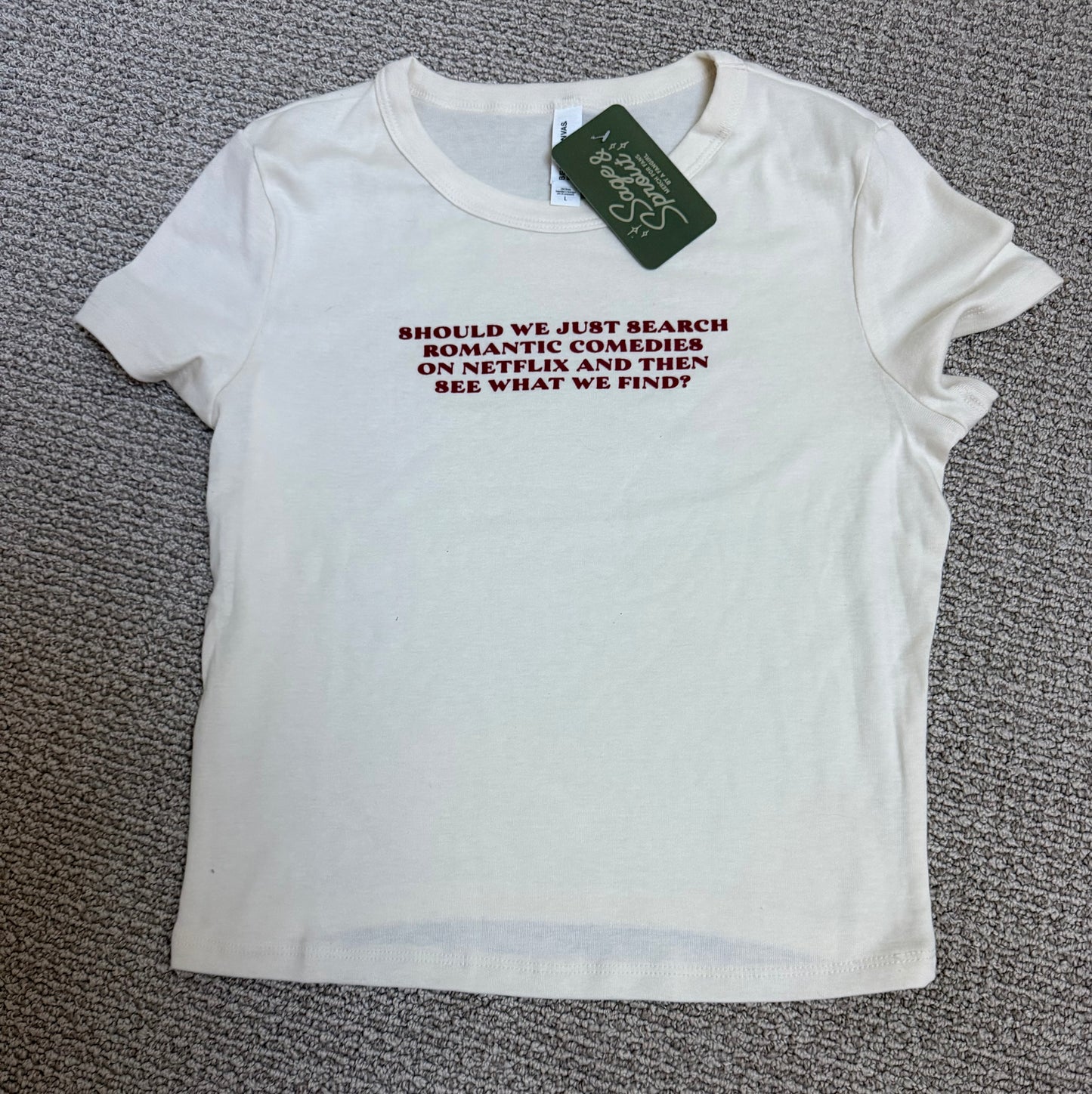 ROMANTIC COMEDIES (We Made Too Much) - L Baby Tee